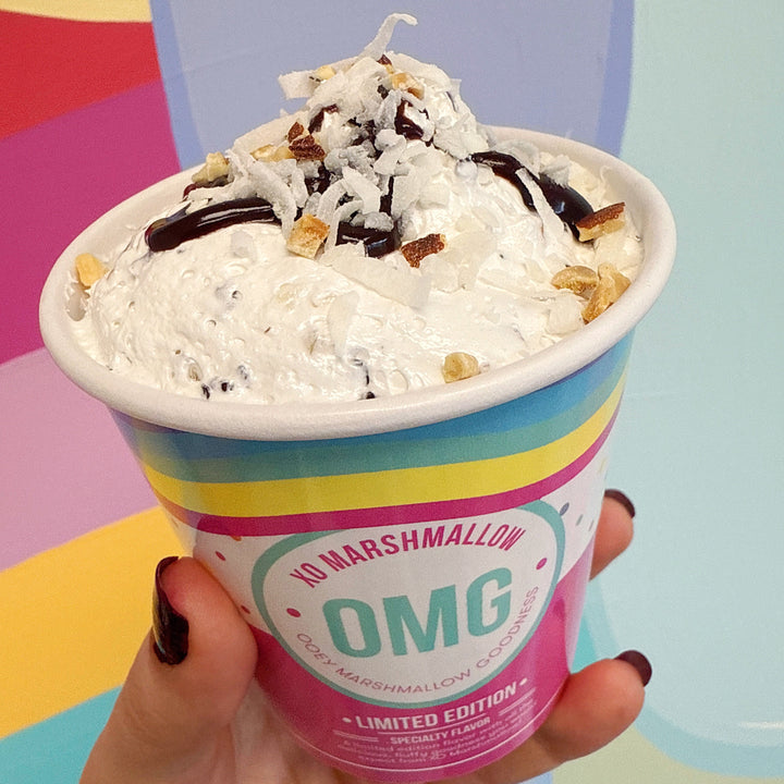 XO Marshmallow Almond Joy Ooey Marshmallow Goodness against a colorful background