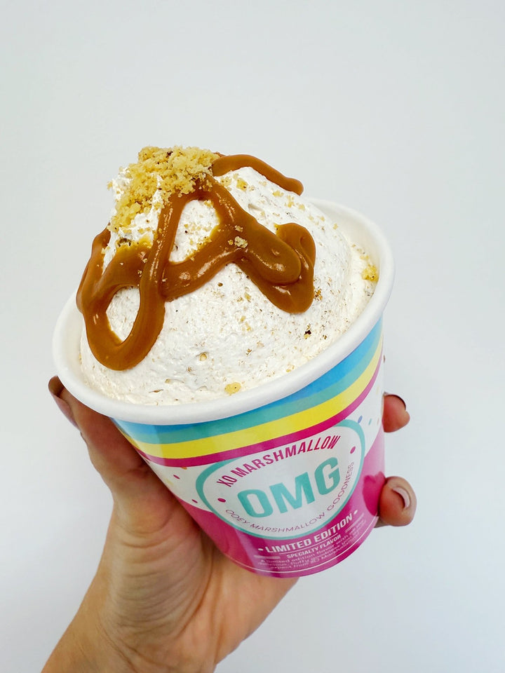 Butterscotch Brown Butter Gourmet Marshmallow Creme in a ice cream pint against a white background