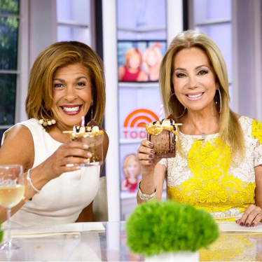 A photo of Cathy Lee and Hoda on the today show drinking hot chocolate cocktails that are topped with XO Marshmallow bourbon flavored marshmallows.