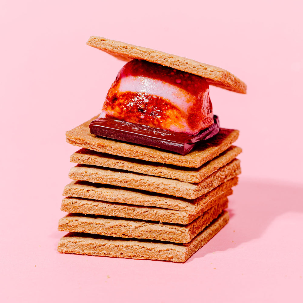 a stack of gluten free graham crackers with a s'more on top of them